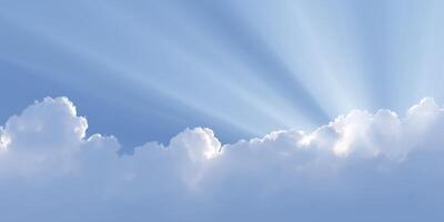Soft white clouds illuminated by sunlight rays create a serene atmosphere in a clear blue sky, evoking feelings of peace and tranquility in nature's beauty photo