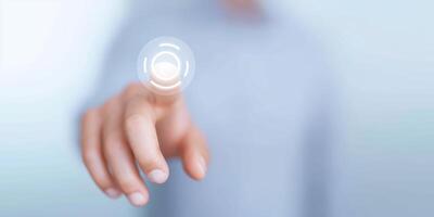 A person pressing a button on a touch screen photo