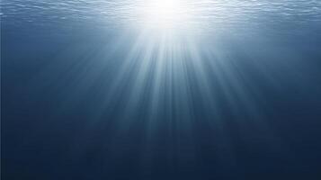 Underwater scene with sunlight rays penetrating the surface, creating a serene atmosphere, showcasing the beauty of aquatic environments and the tranquility of deep water photo