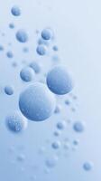 Blue bubbles floating in a soft gradient background creating a serene and calming atmosphere for design and creative projects with copy space photo