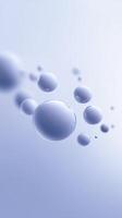 Transparent water droplets suspended in the air against a soft blue gradient background creating a serene and calming atmosphere with copy space photo