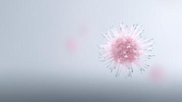 A pink virus is shown in the middle of a gray background photo