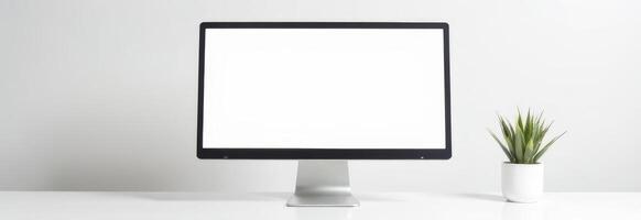 Modern computer monitor on a clean desk with a small potted plant, showcasing minimalistic workspace design and technology aesthetics, workspace concept photo