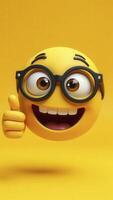 Smiling happy emoji with glasses showing thumbs up on yellow background photo