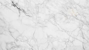 Smooth white marble texture with natural veins and subtle gray patterns photo