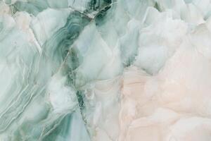 Elegant green and cream marble texture with smooth, flowing patterns photo