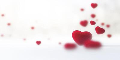 Red hearts floating on white background representing love and romance. Light background create a romantic atmosphere, perfect for valentine's day or any occasion celebrating love photo