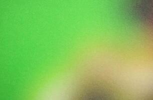 Green and brown gradient background creating a textured visual effect photo