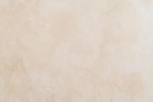 Elegant beige marble texture with subtle veining and soft patterns photo