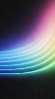Colorful abstract gradient wave pattern on black background photo