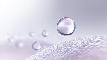 A close up of a drop of water on a white surface photo