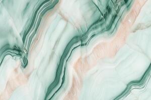 Green and peach marble texture with elegant swirling patterns photo