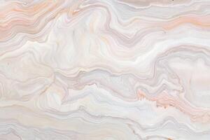 Cream and peach marble texture with flowing abstract patterns photo