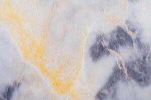 Elegant abstract marble texture with yellow and grey veins photo