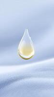 A drop of oil on a white cloth photo