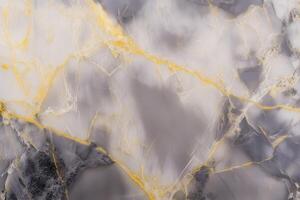 Elegant marble texture with gold veins and soft gray patterns photo