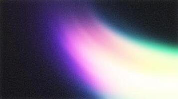 Light leak creating abstract colorful gradient on black background photo