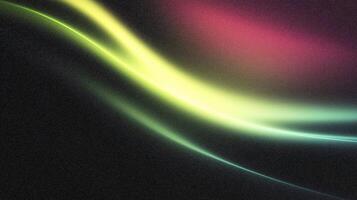 Abstract wave of vibrant colors on dark background photo