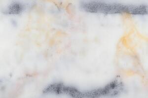 Abstract marble texture with soft orange and gray patterns photo