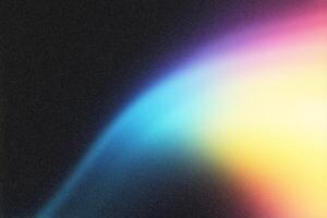 Light painting a colorful gradient on dark textured background photo