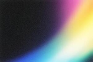 Colorful gradient background fading from black with grain texture photo