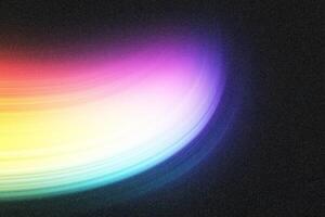 Colorful light trails creating abstract swirling pattern on dark background photo