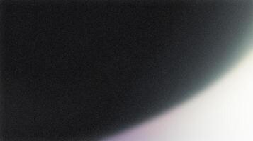Light leak creating gradient on black background with film grain photo