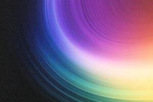 Colorful gradient background showing concentric circles emerging from darkness photo