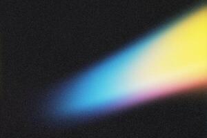 Light beam creating colorful gradient on dark background photo