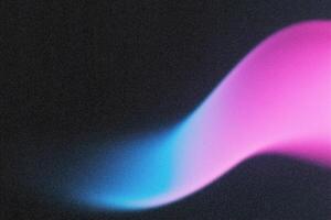Abstract pink and blue light painting on black background photo