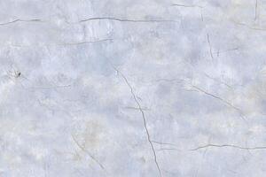 Light gray cracked marble texture with subtle veining patterns photo