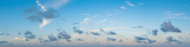 A view of the sky with clouds and airplanes photo
