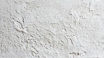 A white wall with a white paint on it photo