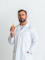 Scientist Holding Test Tube in a Clean Laboratory Environment photo