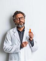 Focused Researcher in Lab Coat Engaged with Test Tube photo