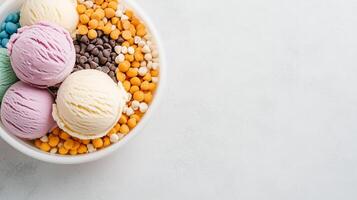 Colorful ice cream in a bowl on a white background photo