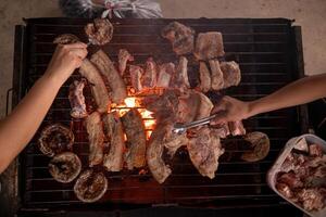 A grill with meat on it photo