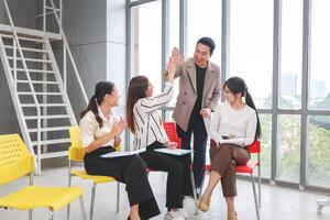 Professional Business Team Collaborating in Modern Office Meeting, Asian man and woman discussing ideas and meeting in office photo