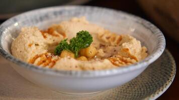 Enjoying fresh hummus at a local eatery in the afternoon video