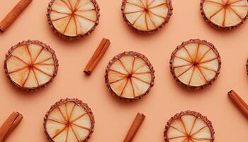 Herb cinnamon and orange slice seamless pattern pink background photo