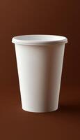 Blank empty white black paper cup recycle for simple disposable container drink in brown background photo