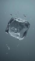 Ice cube with bubble splashing floating on water at story vertical background photo