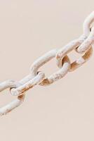 Exploring the meaning of disconnected relationships through the symbolism of a broken chain link photo