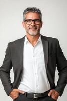 Professional manager posing confidently in a studio setting with bright background photo