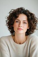 Frustration over limp curls after a perm on a gloomy afternoon in a cozy indoor space photo