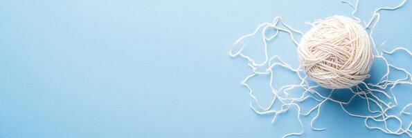 Jumbled thread ball unraveling into chaos illustrating complexities of self-management struggles photo