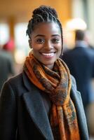 Confident professional smiles with pride after a successful business event in a warm, vibrant setting photo