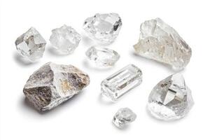 Collection of high-quality danburite crystals on a clean white background showcasing unique shapes and textures photo