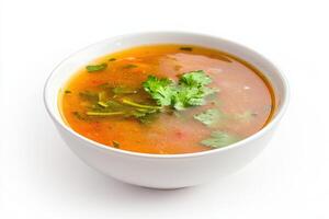 Tom Yum Soup with fresh herbs and spices served in a white bowl on a clean background photo