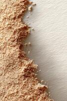 Beige sand texture blends effortlessly with a vivid background for ample copy space photo